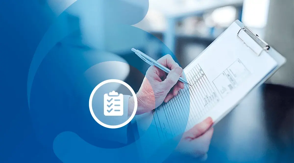 Project manager conducting a thorough review for quality assurance in the pharmaceutical industry, exemplifying effective project management practices.